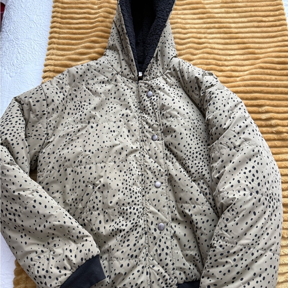 Saltwater Luxe Quilted Puffer Jacket with a dalmatian or polka dot print pattern